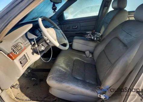 1999 Cadillac Deville z USA, uszkodzony, nr VIN 1G6KD54Y5XU744290